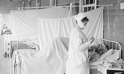 nurse with pateint during spanish influenza outbreak