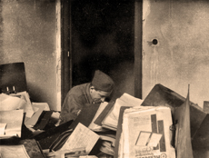 Z. Szajkowski examining documents in the Nazi Propaganda Ministry, Berlin,