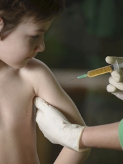 Young child receiving a vaccination
