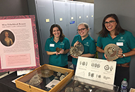 Academy Scientists holding fossils