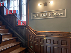 The Writers Room sign on a wall in Ross Commons