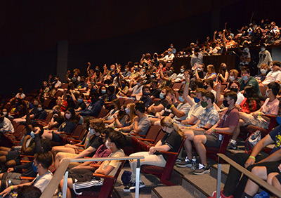 Students in auditorium.