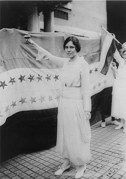 Alice Paul toasting the ratification of the 19th Amendment